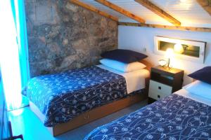 Two-Bedroom Holiday Home room in Seaside family friendly house with a swimming pool Cove Pernatice Drvenik - 11590