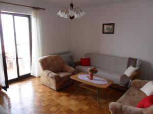 Apartments with a parking space Senj - 11605 