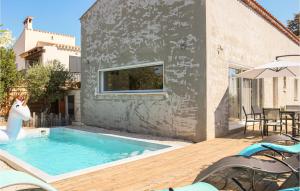 Beautiful home in Gignac-la-Nerthe with Outdoor swimming pool, WiFi and 3 Bedrooms