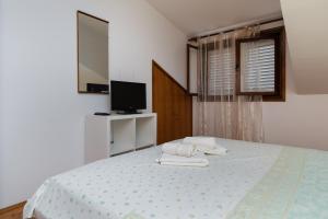 Apartments by the sea Sumpetar, Omis - 11462