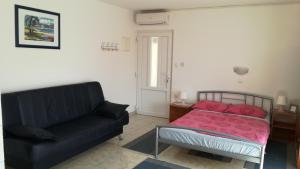 Apartments with parking spaces Barbat, Rab - 11472