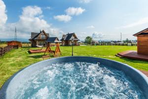 DOMKI TATRY z jacuzzi i sauną w cenie - spokojna okolica - IZBY PODHALAŃSKIE