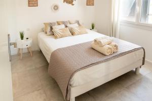 Maisons de vacances L'Oursinade - Jolie maison avec Jacuzzi et jardin : photos des chambres