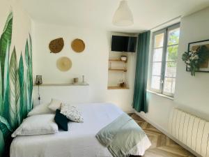 Appartements Le Tropical - Studio avec terrasse : photos des chambres