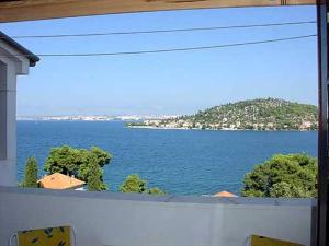 Apartments and rooms with a swimming pool Kali, Ugljan - 14083