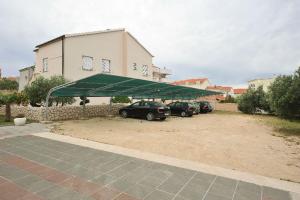 Family friendly apartments with a swimming pool Novalja, Pag - 14394