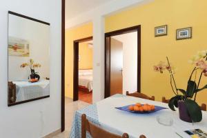 Family friendly apartments with a swimming pool Novalja, Pag - 14394