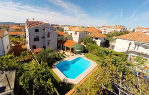 Family friendly apartments with a swimming pool Zadar - 16336 