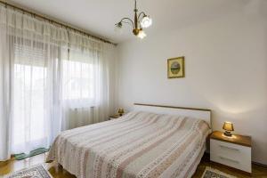 Apartments with a parking space Umag - 16354