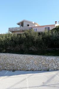 Apartments with parking space Kolan, Pag - 16482