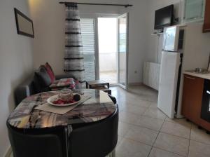 One-Bedroom Apartment with Terrace and Sea View room in Seaside apartments with a swimming pool Arbanija Ciovo - 16478