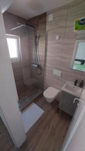 Apartmani Mlinar - Two bedroom apartment with seaview