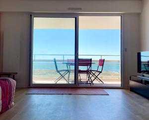 Appartements Large studio direct access to the beach : photos des chambres