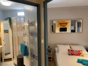 Appartements Studio Carmes,entree autonome,climatise,parking prive payant : photos des chambres