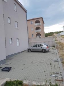 Apartments with a parking space Novi Vinodolski - 16998