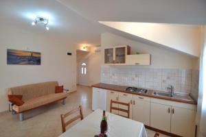 One-Bedroom Apartment with Balcony and Sea View room in Apartments with a parking space Sukosan Zadar - 17027