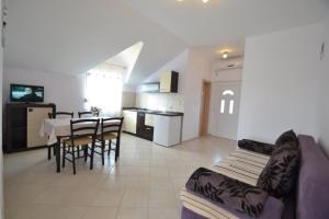 One-Bedroom Apartment with Terrace and Sea View room in Apartments with a parking space Sukosan Zadar - 17027