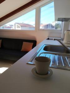 Apartments with parking space Lopar, Rab - 16680