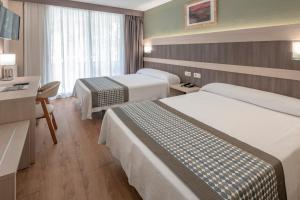 Quadruple Room (2 Adults + 2 Children) room in 4R Playa Park