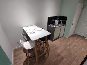 Appartements NG SUITEHOME COQ FRANCAIS : photos des chambres