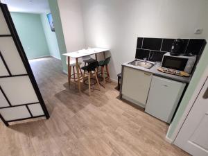 Appartements NG SUITEHOME COQ FRANCAIS : photos des chambres