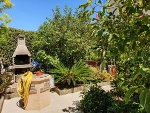 Apartments with parking space Palit, Rab - 18681