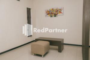 Pits Hotel Mitra RedDoorz near Atom Mall