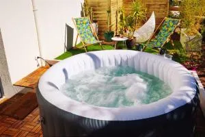 Superbe appartement avec jacuzzi avec jardin privé - 德希内斯·尚皮埃