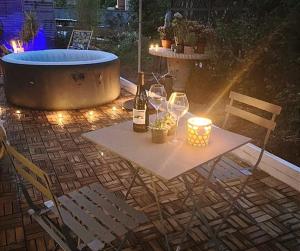 Superbe appartement avec jacuzzi avec jardin privé