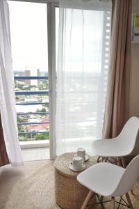 Quince Studio w Balcony Orochi Staycation PH at Loop Tower CDO