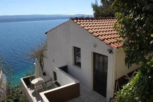 Apartments by the sea Stanici, Omis - 1049 