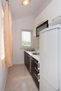 Apartments by the sea Postira, Brac - 705