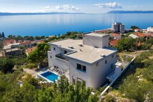 Family friendly apartments with a swimming pool Podgora, Makarska - 18920