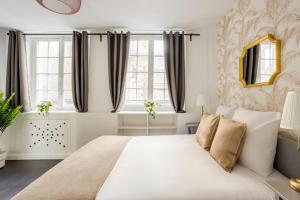 Appartements Cosy 5 bedrooms with patio - Louvre Museum : photos des chambres