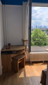 Appartements Charme et haut standing - Vue sur La Defense : photos des chambres