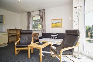 nah am Meer, ruhige Lage, gratis Nutzung vom AHOI Erlebnisbad und Sauna in Sellin - Haus Inselblick FeWo 02