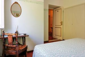 Dreibettzimmer mit Gartenblick