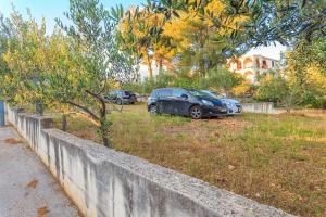 Seaside apartments with a swimming pool Rastici, Ciovo - 1084