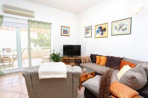 Seaside apartments with a swimming pool Rastici, Ciovo - 1084