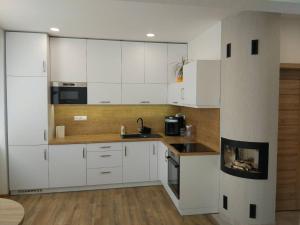 Moderný apartmán s krbom a klimatizáciou