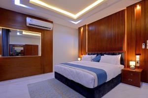 شقق اجنحة كنزان للشقق المخدومة Knzan Suites