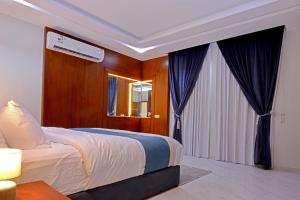 شقق اجنحة كنزان للشقق المخدومة Knzan Suites