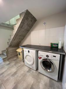 Maison spacieuse avec grand jardin et parking à 20 min de Lyon