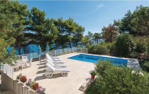 Seaside apartments with a swimming pool Lumbarda, Korcula - 4404