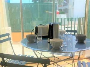 Appartements Charmant studio climatise en rez-de-jardin, proche plage, avec garage prive a Cavalaire-sur-Mer - FR-1-226B-116 : photos des chambres