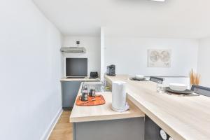 Appartements L'Aristide #HyperCentre #Paisible : photos des chambres