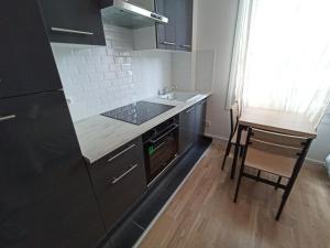 Appartements Studio cosy - Hypercentre - 20 min to Paris : photos des chambres