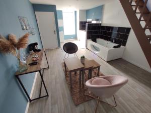 Appartements NG SUITEHOME BLANC SEAU BALNEO : photos des chambres