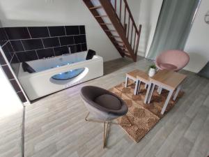 Appartements NG SUITEHOME BLANC SEAU BALNEO : photos des chambres