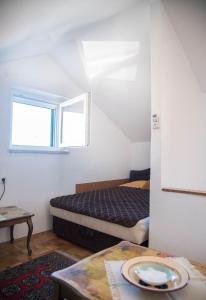 Apartments with a parking space Postira, Brac - 6049